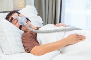 man with cpap machine 